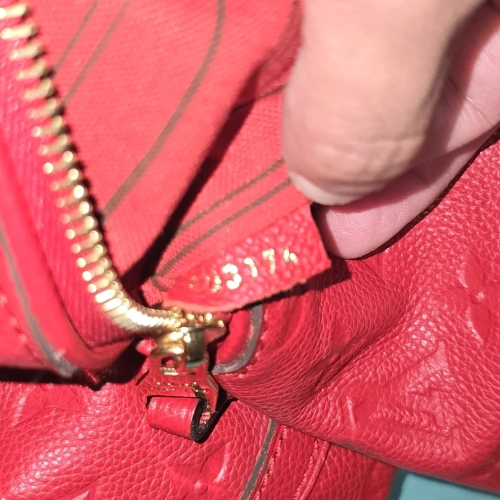Authentic Louis Vuitton Red Monogram Emperiente Leather Bag